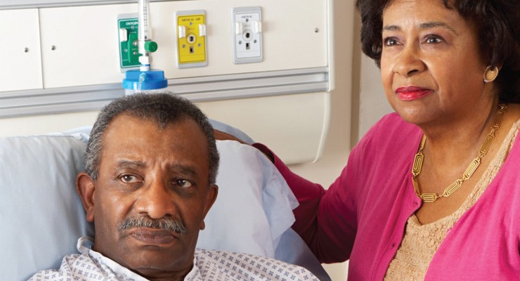 patient and wife in hospital room.